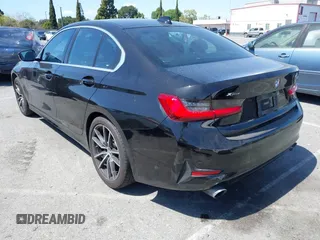 2019 BMW 3 Series 330i xDrive with VIN WBA5R7C5XKAJ78505, listed as a IAAI auction lot 41955059 with 53,216 mi miles. Bid and sale history available at carsss.com. Image 3.