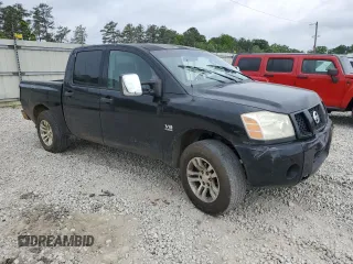 2004 Nissan Titan LE with VIN 1N6AA07A34N573514, listed as a Copart auction lot 54497765 with 240,033 mi miles and Salvage title. Bid and sale history available at DreamBid. Image 4.