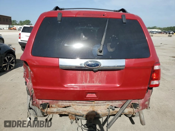2010 Ford Escape Limited с VIN 1FMCU9EG4AKC56901, выставлен на аукционе Copart как лот 57163525 с пробегом 165 993 миль миль и Списание • Salvage title. История ставок и продаж доступна на DreamBid. Изображение 6.