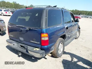2003 Chevrolet Tahoe LT with VIN 1GNEC13Z13J280286, listed as a IAAI auction lot 42010980 with 1 mi miles. Bid and sale history available at carsss.com. Image 4.
