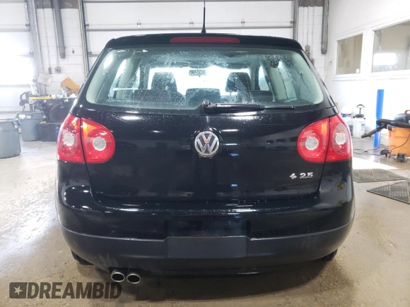 2009 Volkswagen Rabbit S with VIN WVWAA71K69W001495, listed as a Copart auction lot 86813914 with 147,398 mi miles and Salvage title. Bid and sale history available at DreamBid. Image 6.