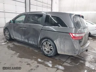 2012 Honda Odyssey EX-L with VIN 5FNRL5H66CB101151, listed as a IAAI auction lot 41504250 with 261,836 mi miles. Bid and sale history available at carsss.com. Image 3.