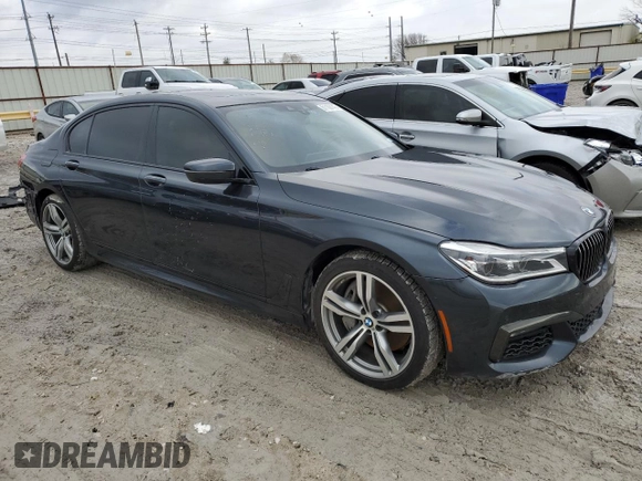 2018 BMW 7 Series 750i with VIN WBA7F0C55JGM23795, listed as a Copart auction lot 81168143 with 114,285 mi miles and Salvage Title. Bid and sale history available at carsss.com. Image 4.