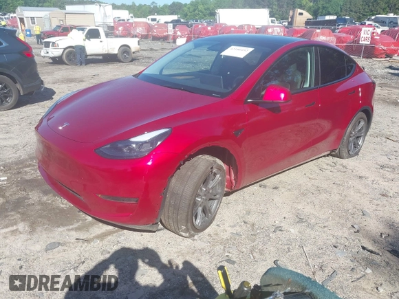 2024 Tesla Model Y z VIN 7SAYGDED2RA325538, wystawiony jako IAAI lot #42180492 z przebiegiem 8 738 mil mil oraz . Historia ofert i sprzedaży dostępna na DreamBid. Obrazek 17.