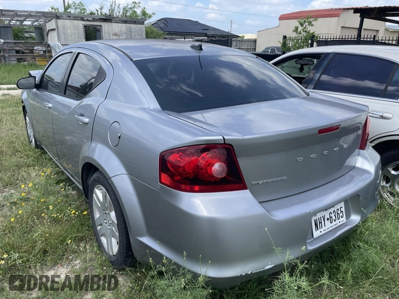 2014 Dodge Avenger SE with VIN 1C3CDZAB8EN149812, listed as a IAAI auction lot 42092082 with 126,244 mi miles and . Bid and sale history available at DreamBid. Image 3.