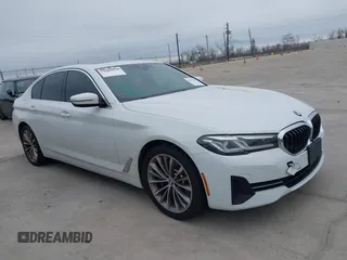2021 BMW 5 Series 530e with VIN WBA13AG00MCF75324, listed as a IAAI auction lot 41615665 with 51,969 mi miles and . Bid and sale history available at carsss.com. Image 1.