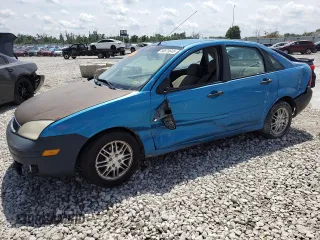 2007 Ford Focus S with VIN 1FAFP34NX7W128451, listed as a Copart auction lot 60875645 with 302,214 mi miles and Salvage title. Bid and sale history available at DreamBid. Image 1.