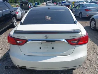2017 Nissan Maxima S with VIN 1N4AA6APXHC371182, listed as a IAAI auction lot 42596000 with 159,710 mi miles and . Bid and sale history available at DreamBid. Image 16.