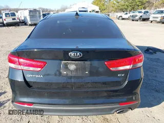 2018 Kia Optima EX with VIN 5XXGU4L31JG209828, listed as a IAAI auction lot 41762547 with 169,408 mi miles and . Bid and sale history available at carsss.com. Image 16.