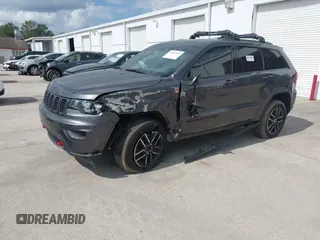 2018 Jeep Grand Cherokee Trailhawk with VIN 1C4RJFLG8JC427345, listed as a IAAI auction lot 41557222 with 49,469 mi miles and . Bid and sale history available at DreamBid. Image 2.