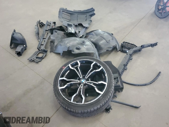 2020 BMW X4 M z VIN 5YMUJ0C06LLA99799, wystawiony jako Copart lot #65583704 z przebiegiem 32 033 mil mil oraz Szkoda całkowita • Salvage title. Historia ofert i sprzedaży dostępna na DreamBid. Obrazek 13.