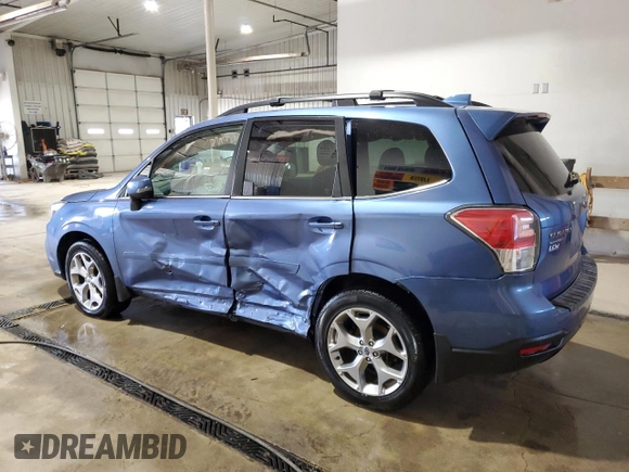 2017 Subaru Forester Touring z VIN JF2SJAWC9HH564242, wystawiony jako Copart lot #59209265 z przebiegiem Nie podano mil oraz Szkoda całkowita • Salvage title. Historia ofert i sprzedaży dostępna na DreamBid. Obrazek 2.
