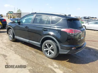 2018 Toyota RAV4 XLE with VIN 2T3WFREVXJW444002, listed as a IAAI auction lot 41795600 with 115,120 mi miles. Bid and sale history available at carsss.com. Image 3.