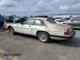1989 Jaguar XJS z VIN SAJNY584XKC161154, wystawiony jako Copart lot #70912984 z przebiegiem 65 188 mil mil oraz Czysty tytuł • Clean title. Historia ofert i sprzedaży dostępna na DreamBid. Obrazek 2.