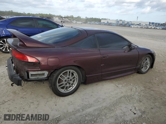 1999 Mitsubishi Eclipse with VIN 4A3AK44Y7XE104372, listed as a Copart auction lot 78361734 with 112,595 mi miles and Salvage Title. Bid and sale history available at DreamBid. Image 3.