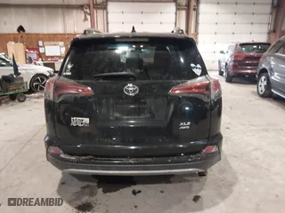 2017 Toyota RAV4 XLE with VIN 2T3RFREV0HW669312, listed as a IAAI auction lot 41410721 with 99,404 mi miles. Bid and sale history available at carsss.com. Image 16.