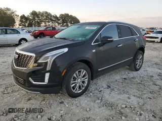 2022 Cadillac XT5 AWD Premium Luxury with VIN 1GYKNDRS7NZ125953, listed as a Copart auction lot 73462354 with 35,410 mi miles and Salvage title. Bid and sale history available at DreamBid. Image 1.