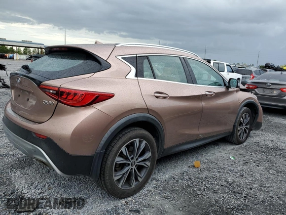 2018 Infiniti QX30 Premium with VIN SJKCH5CR7JA041151, listed as a Copart auction lot 65256585 with 129,102 mi miles and Salvage title. Bid and sale history available at DreamBid. Image 3.