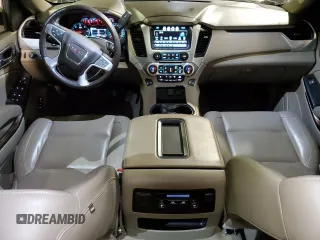 2020 GMC Yukon SLT Standard Edition with VIN 1GKS2DKC5LR286112, listed as a Copart auction lot 82692994 with 87,959 mi miles and Salvage Title. Bid and sale history available at carsss.com. Image 8.