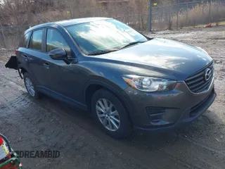 2016 Mazda CX-5 Sport with VIN JM3KE4BY5G0829927, listed as a IAAI auction lot 41678552 with 121,476 mi miles. Bid and sale history available at carsss.com. Image 1.