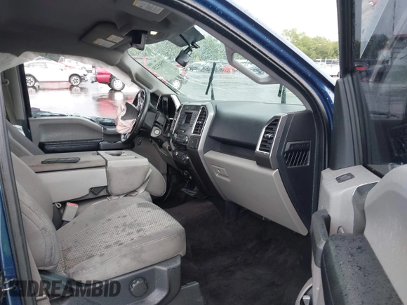 2015 Ford F-150 XLT with VIN 1FTEW1EP3FKF22540, listed as a IAAI auction lot 39565229 with 127,825 mi miles. Bid and sale history available at carsss.com. Image 5.