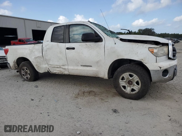 2010 Toyota Tundra z VIN 5TFRM5F10AX019942, wystawiony jako Copart lot #52418865 z przebiegiem Nie podano mil oraz Szkoda całkowita • Salvage title. Historia ofert i sprzedaży dostępna na DreamBid. Obrazek 4.