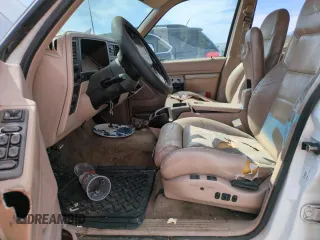 1992 Ford Explorer Eddie Bauer with VIN 1FMDU34X2NUE11927, listed as a Copart auction lot 52094875 with 53,449 mi miles and Salvage title. Bid and sale history available at DreamBid. Image 7.
