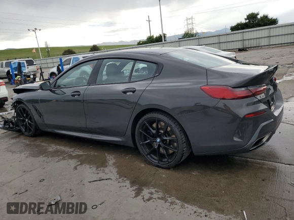 2020 BMW 8 Series M850i with VIN WBAGV8C0XLCD64228, listed as a Copart auction lot 60908315 with 67,643 mi miles and Salvage title. Bid and sale history available at DreamBid. Image 2.