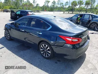 2017 Nissan Altima SV with VIN 1N4AL3AP1HC170246, listed as a IAAI auction lot 42594543 with 150,230 mi miles and . Bid and sale history available at DreamBid. Image 3.