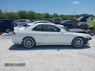 2000 Honda Prelude with VIN JHMBB6245YC007217, listed as a IAAI auction lot 42073430 with 133,492 mi miles and . Bid and sale history available at DreamBid. Image 14.
