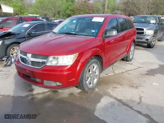 2009 Dodge Journey SXT with VIN 3D4GG57V49T507480, listed as a IAAI auction lot 41872066 with 273,853 mi miles. Bid and sale history available at carsss.com. Image 2.