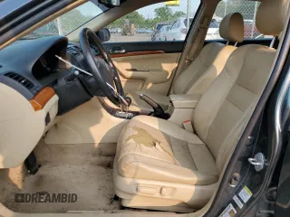 2006 Acura TSX z VIN JH4CL96886C001974, wystawiony jako Copart lot #59295085 z przebiegiem 220 009 mil mil oraz Szkoda całkowita • Salvage title. Historia ofert i sprzedaży dostępna na DreamBid. Obrazek 7.
