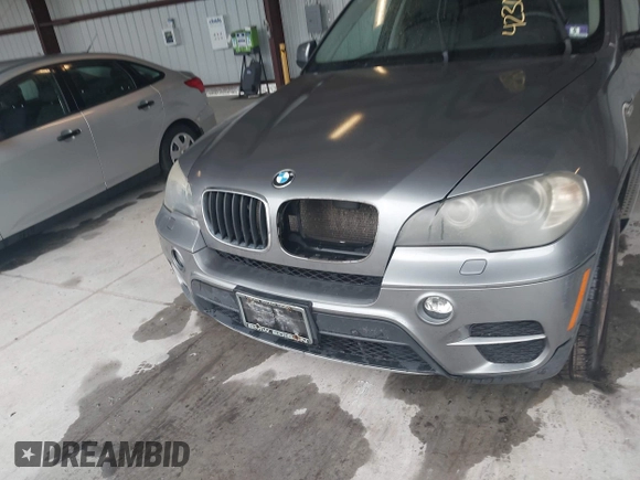 2011 BMW X5 35i z VIN 5UXZV4C50BL402270, wystawiony jako IAAI lot #42306042 z przebiegiem 166 977 mil mil oraz . Historia ofert i sprzedaży dostępna na DreamBid. Obrazek 6.