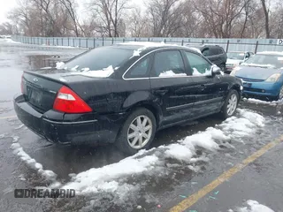 2005 Ford Five Hundred Limited z VIN 1FAFP28135G163356, wystawiony jako IAAI lot #41625946 z przebiegiem 160 869 mil mil oraz . Historia ofert i sprzedaży dostępna na DreamBid. Obrazek 4.