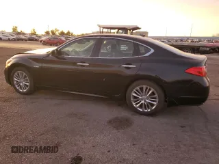 2012 Infiniti M Hybrid with VIN JN1EY1AP0CM910053, listed as a Copart auction lot 85345224 with 121,711 mi miles and Salvage title. Bid and sale history available at DreamBid. Image 2.