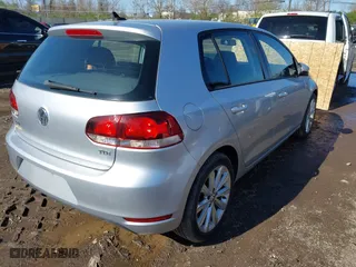 2013 Volkswagen Golf TDI with VIN WVWDM7AJ0DW138100, listed as a IAAI auction lot 41978728 with 103,264 mi miles. Bid and sale history available at carsss.com. Image 4.