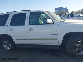 2003 Chevrolet Tahoe LT with VIN 1GNEC13Z73R168819, listed as a IAAI auction lot 41679179 with 141,164 mi miles. Bid and sale history available at carsss.com. Image 12.