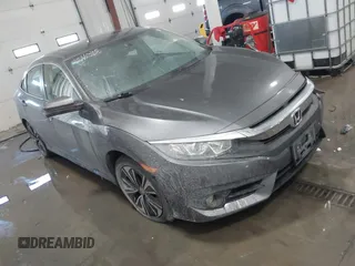 2018 Honda Civic EX-T z VIN JHMFC1F35JX031132, wystawiony jako IAAI lot #41591028 z przebiegiem 111 087 mil mil oraz . Historia ofert i sprzedaży dostępna na DreamBid. Obrazek 1.
