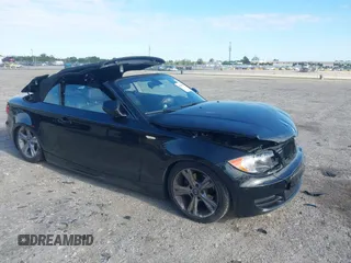 2011 BMW 1 Series 128i with VIN WBAUL7C54BVM80474, listed as a IAAI auction lot 42031032 with 76,617 mi miles and . Bid and sale history available at carsss.com. Image 1.