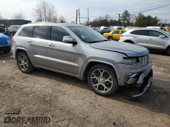 2019 Jeep Grand Cherokee Overland with VIN 1C4RJFCG9KC840084, listed as a Copart auction lot 47440845 with 101,281 mi miles and Salvage Title. Bid and sale history available at carsss.com. Image 4.