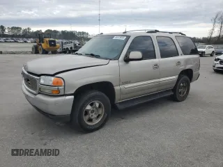 2004 GMC Yukon SLT with VIN 1GKEK13Z14R132643, listed as a Copart auction lot 46973935 with 290,963 mi miles and Salvage Title. Bid and sale history available at carsss.com. Image 1.