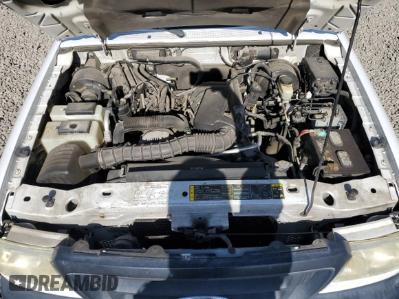 2005 Ford Ranger XLT z VIN 1FTYR44U85PA99825, wystawiony jako Copart lot #56319725 z przebiegiem 94 335 mil mil oraz Szkoda całkowita • Salvage title. Historia ofert i sprzedaży dostępna na DreamBid. Obrazek 11.