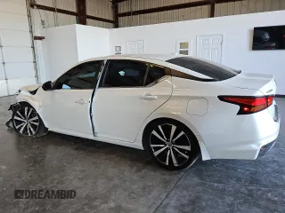 2020 Nissan Altima SR with VIN 1N4AL4CV8LC151610, listed as a Copart auction lot 82953194 with 104,357 mi miles and Clean Title. Bid and sale history available at carsss.com. Image 2.
