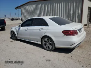 2016 Mercedes-Benz E 350 Luxury with VIN WDDHF8JB0GB189737, listed as a Copart auction lot 52492805 with 161,916 mi miles and Salvage Title. Bid and sale history available at DreamBid. Image 2.