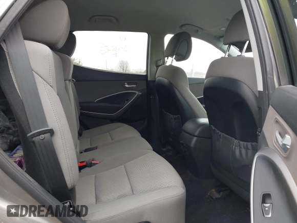 2016 Hyundai Santa Fe z VIN 5XYZTDLB1GG343763, wystawiony jako IAAI lot #41659641 z przebiegiem 96 415 mil mil oraz . Historia ofert i sprzedaży dostępna na DreamBid. Obrazek 8.