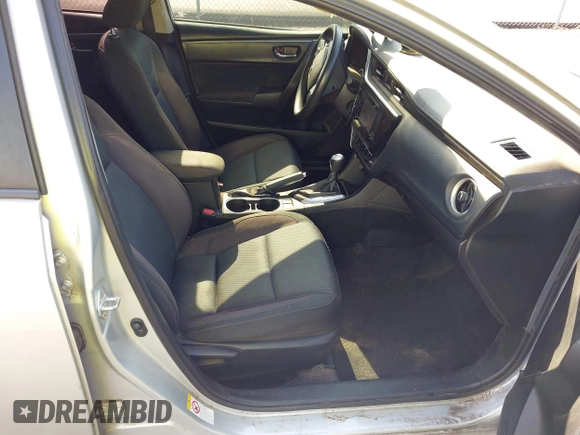 2018 Toyota Corolla L with VIN 5YFBURHEXJP810003, listed as a IAAI auction lot 42526648 with 84,546 mi miles and . Bid and sale history available at DreamBid. Image 5.