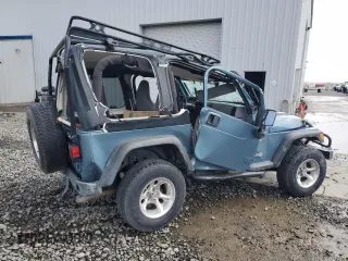 1998 Jeep Wrangler Sport z VIN 1J4FY19S8WP788484, wystawiony jako Copart lot #50835275 z przebiegiem Nie podano mil oraz Szkoda całkowita • Salvage title. Historia ofert i sprzedaży dostępna na DreamBid. Obrazek 3.