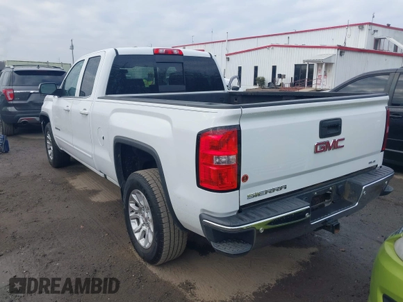 2017 GMC Sierra 1500 SLE z VIN 1GTV2MEC0HZ311932, wystawiony jako IAAI lot #40888769 z przebiegiem 72 676 mil mil oraz . Historia ofert i sprzedaży dostępna na DreamBid. Obrazek 3.