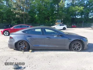 2022 Tesla Model S with VIN 5YJSA1E57NF479056, listed as a IAAI auction lot 42091009 with 78,272 mi miles and . Bid and sale history available at DreamBid. Image 13.