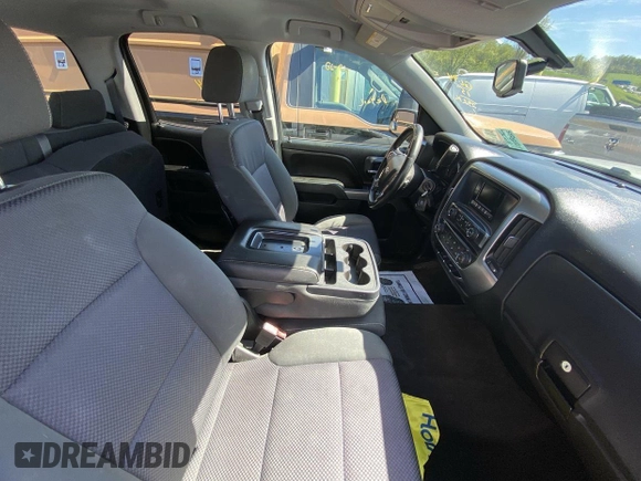 2015 Chevrolet Silverado 1500 LT with VIN 1GCVKREH2FZ315082, listed as a IAAI auction lot 42195581 with 232,496 mi miles. Bid and sale history available at carsss.com. Image 1.